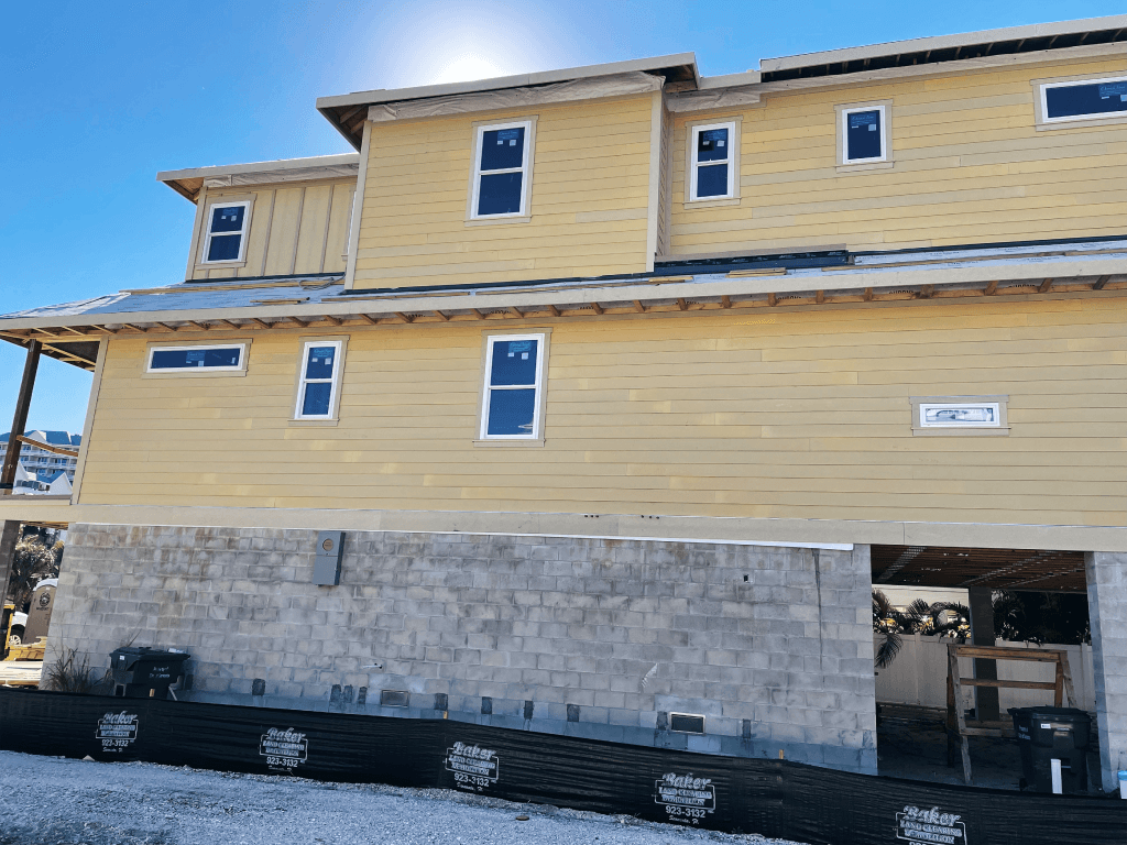 Residential construction by Acosta Builders in Bradenton, FL — structural framing and exterior envelope work in progress